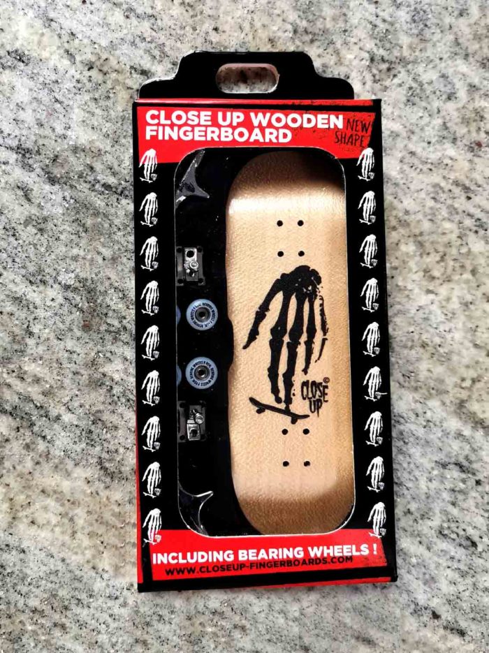 Close Up Fingerboard Skull Hand Logo Wood